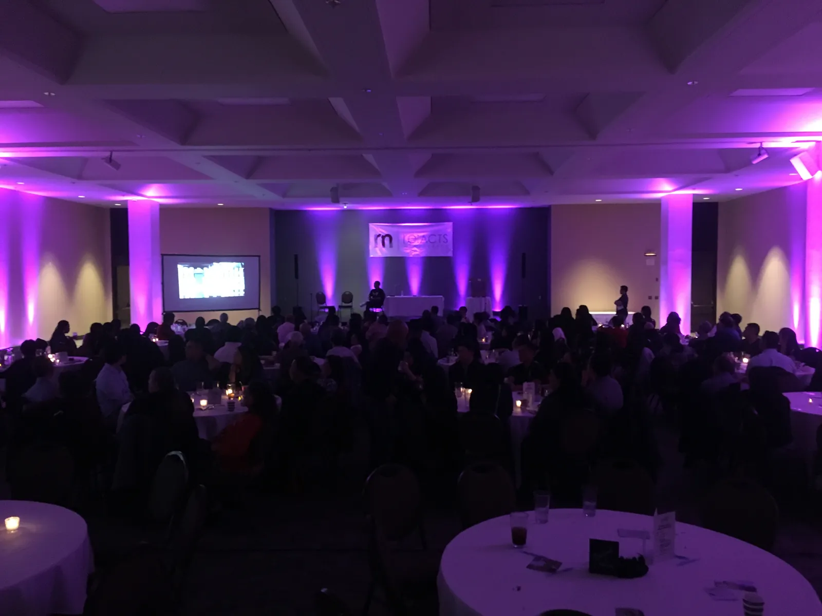 Banquet hall with purple uplighting